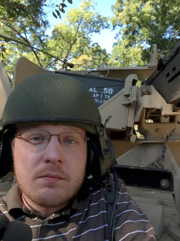 James driving the tank